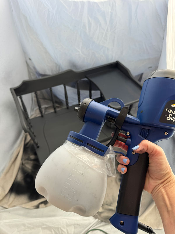 Using a paint sprayer on a telephone table