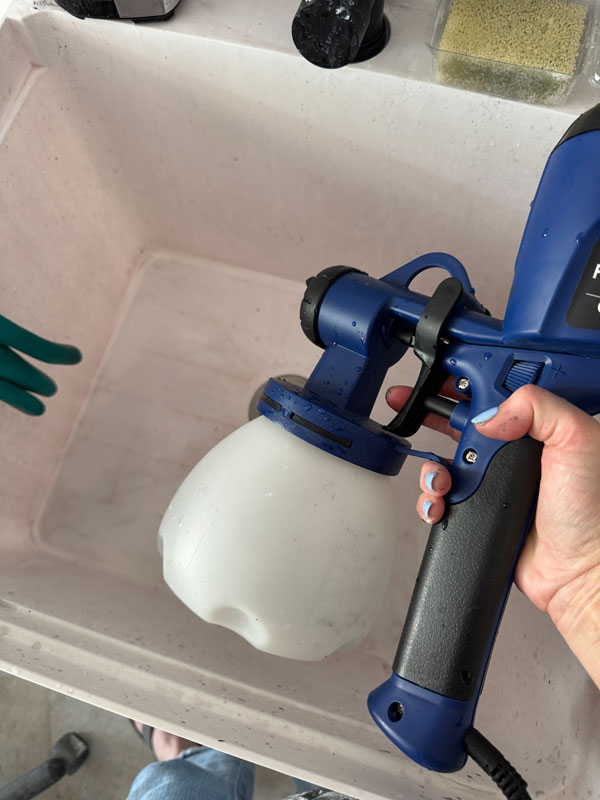 Using a paint sprayer on a telephone table