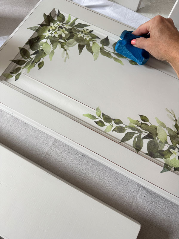 Sealing with Clear Coat in the satin finish using a blue sponge applicator.